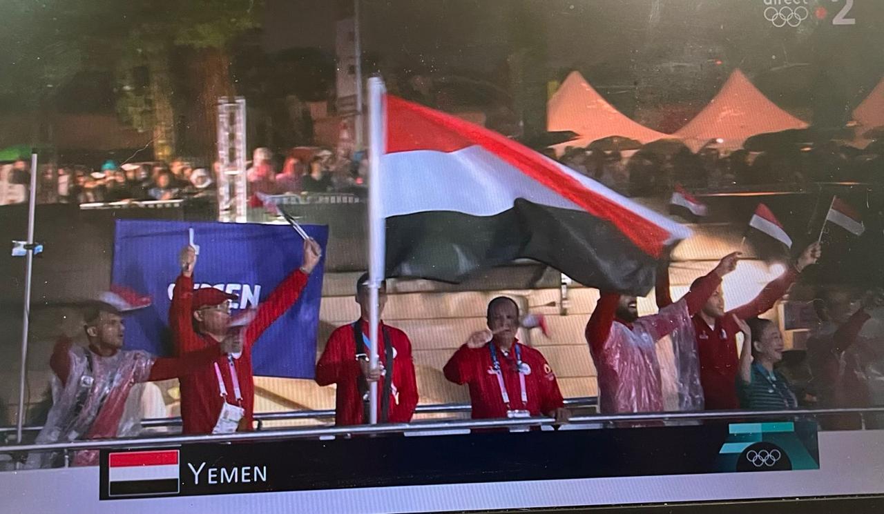 Yemeni athletes proudly hoist their flag at the Paris 2024 Olympics opening ceremony.