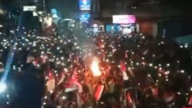 Despite militia threats, Yemenis celebrate the September 26 Revolution with bonfires and fireworks.