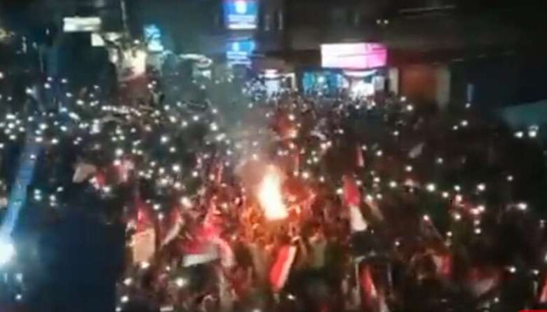 Despite militia threats, Yemenis celebrate the September 26 Revolution with bonfires and fireworks.