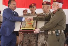 Local authorities honor the former commander of the First Military Region for his dedicated service and leadership.