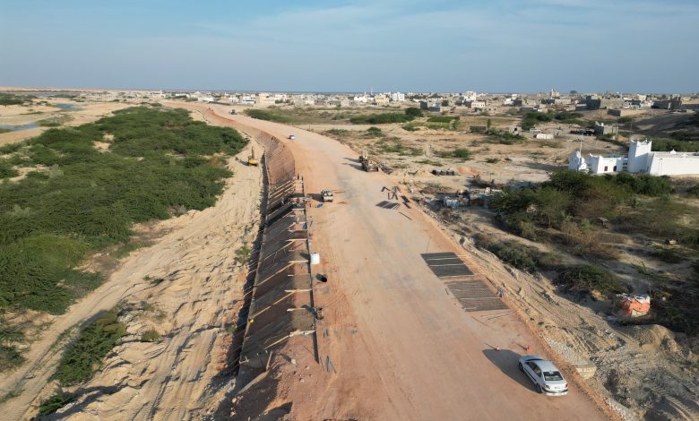 Side protection work continues on the truck-only ring road in Al-Ghaydah city.