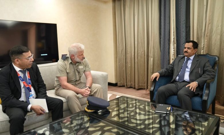 The Defense Minister discusses military developments with the British military attaché.