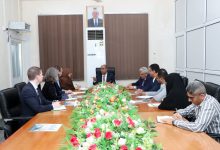 The Finance Minister discusses economic updates and their broader implications with the UN envoy's economic advisor.