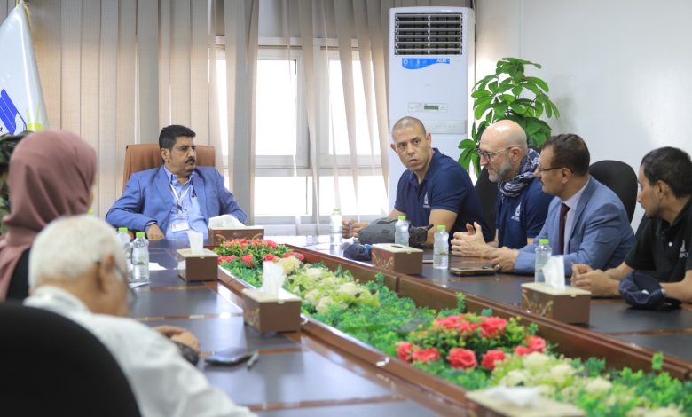 An Interpol delegation discusses joint cooperation with key service facilities in Aden.