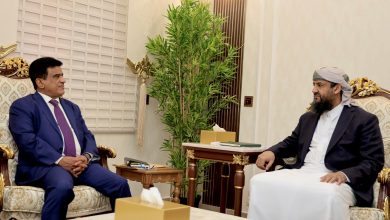 A member of the leadership council reviews the Ministry of Oil's plans for developing fuel distribution systems.