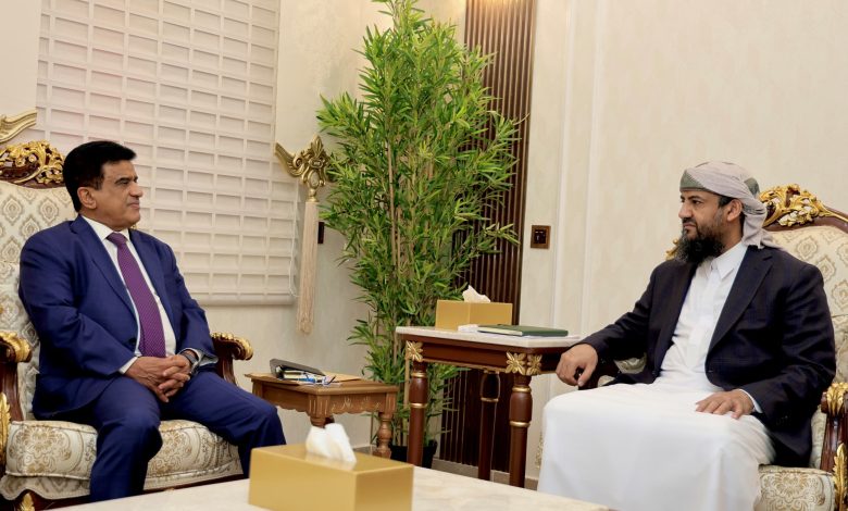 A member of the leadership council reviews the Ministry of Oil's plans for developing fuel distribution systems.