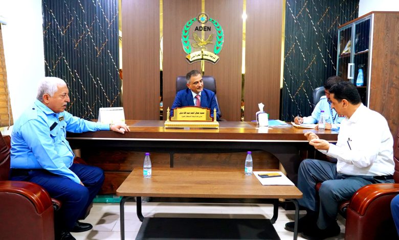 The Minister of State and Governor of Aden reviews operations at the container port.