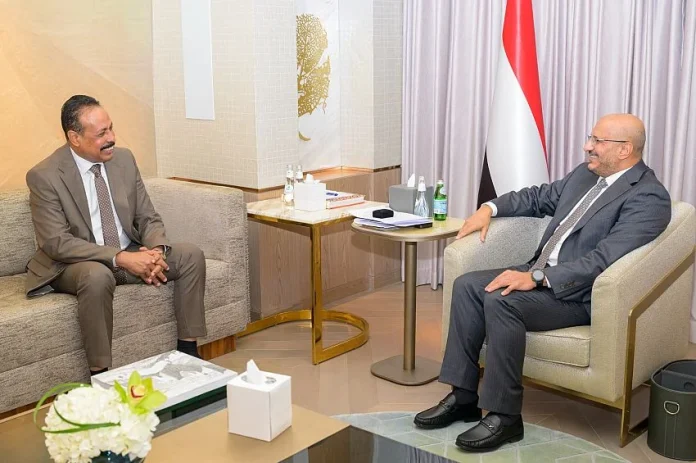 Council member Tariq Saleh discusses reconstruction priorities with the Minister of Public Works.